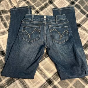 Ariat jeans mid rise boot. Never worn.